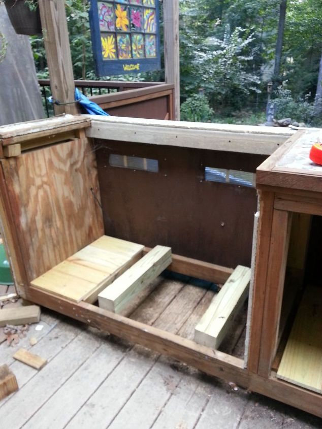 making your grill look built in, Originally there was a floor and the grill was set inside and one side had to be propped Changed my design to accommodate the uneven grill legs this time I worked alone and did my idea and I am very happy with my results