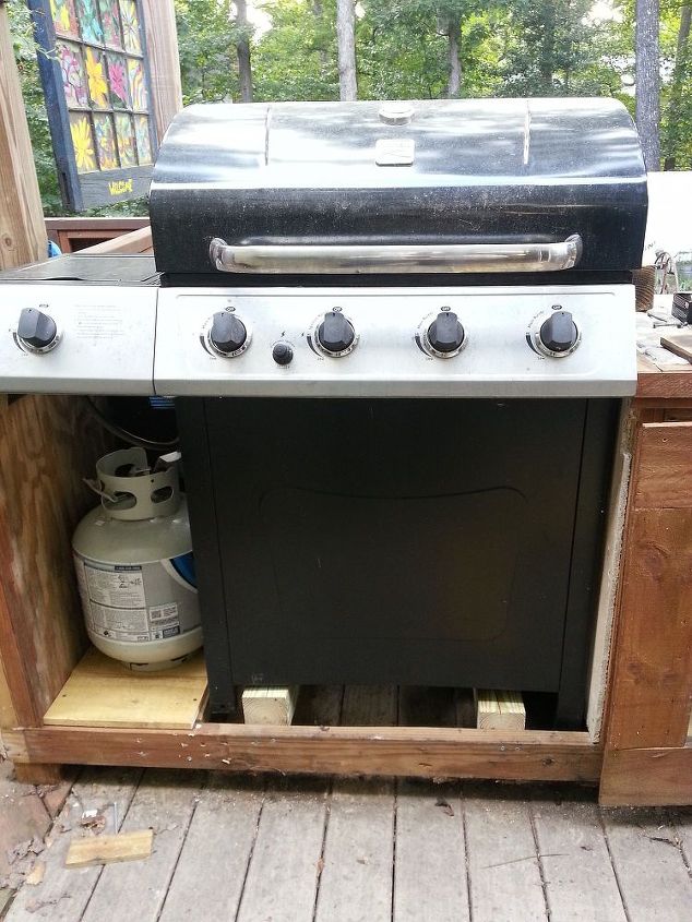 making your grill look built in, See the grill sets on the 4x4 blocks and the LP tank off to side reinforced under the wood for the LP You could actually have the grill sit on the deck