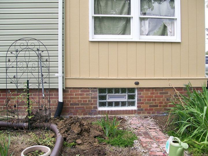 crack in foundation, basement ideas, concrete masonry, curb appeal, home maintenance repairs, how to, Crack is a few inches to the right of the gutter drain