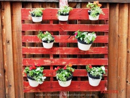 20 creative ways to upcycle pallets in your garden, gardening, pallet, repurposing upcycling, This idea could be adapted for use as a privacy screen wall art herb planters or just a decorative feature