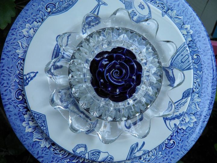 finally started making my plate flowers and glass towers what fun, Close up shows the center rose in a beautiful dark blue Hoping I can find more of these