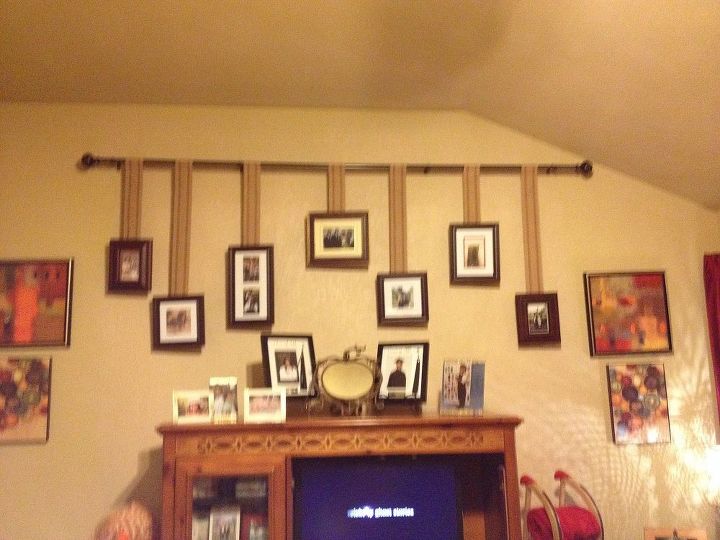curtain rod turn picture rod holder, home decor, wall decor, These frames are heavy so I use furniture strapping and stapled it to back of frames