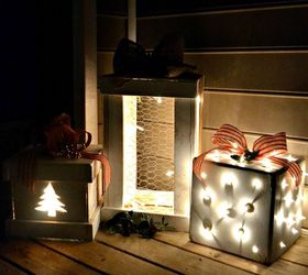 make pretty light up wooden presents for your porch, lighting, porches, seasonal holiday decor, The trio of presents lights up at night