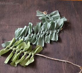 how to make a christmas tree wall art, crafts, seasonal holiday decor, Cut fabric strips and tie in knots around twine I used an ombre effect