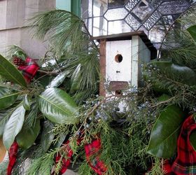 potting shed christmas nesting feathering, christmas decorations, decks, gardening, seasonal holiday decor, wreaths, A birdhouse is perched in the window box along with magnolia cedar cypress and pine A tartan ribbon swags through for a little color