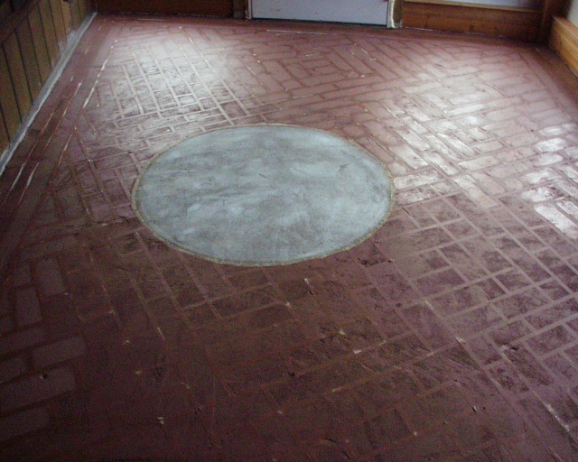 painted concrete floors that last and last and last, The second coat is the brick red from before with some beigemixed in slightly warmerand lighter in tone I put it down in each brick leaving an outline of the darker brick red on the edges