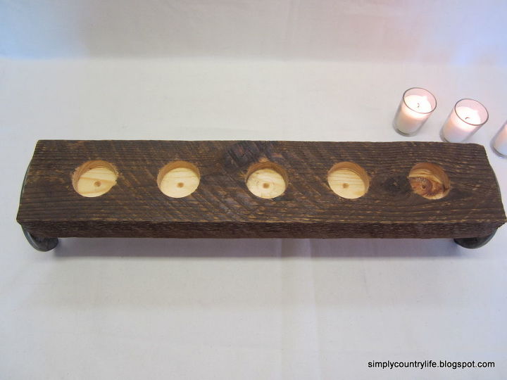 repurpose horseshoes and wood into a rustic country candle holder, crafts, repurposing upcycling, spaces drilled for candle holders