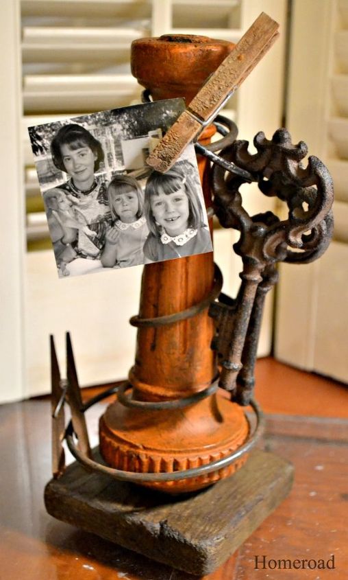 rusty spring photo display, crafts, repurposing upcycling, Add a few clothespins vintage keys and photos and you ve got one awesome photo display