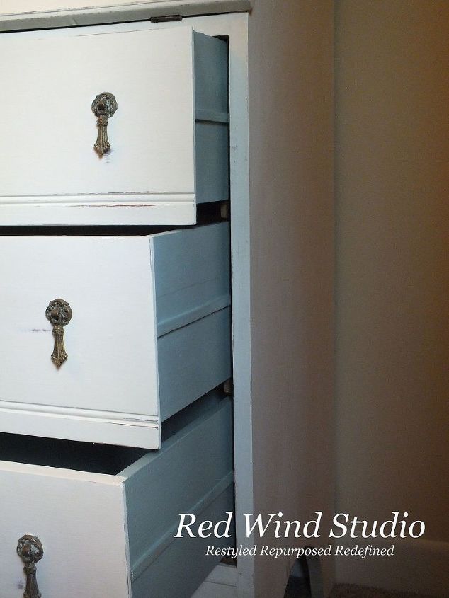 I don’t always paint the drawers but in this case I wanted the continuity. It makes the piece look finished and properly dressed. The drawers were a little rough and I wanted to make sure if someone wanted to put nice table linens in the drawers they wouldn’t snag on anything.
I put all the hardware back on just the way it was and there you have it. It turned into a pretty little multi-functional unit ready to display treasures and use as a mini office.