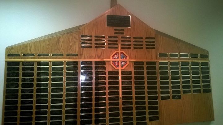 wall display i built for our church a few years back, diy, woodworking projects, I could not get the entire thing in the picture because of the width of the hallway The big plate at the top has our dedication and the smaller ones under it has the pastors names The bottom ones are the gifts and the givers names