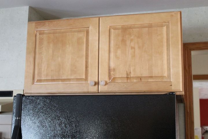how to tie in an above the fridge cupboard and an existing bulk head, home decor, kitchen cabinets, kitchen design, The new maple storage cabinet above the fridge