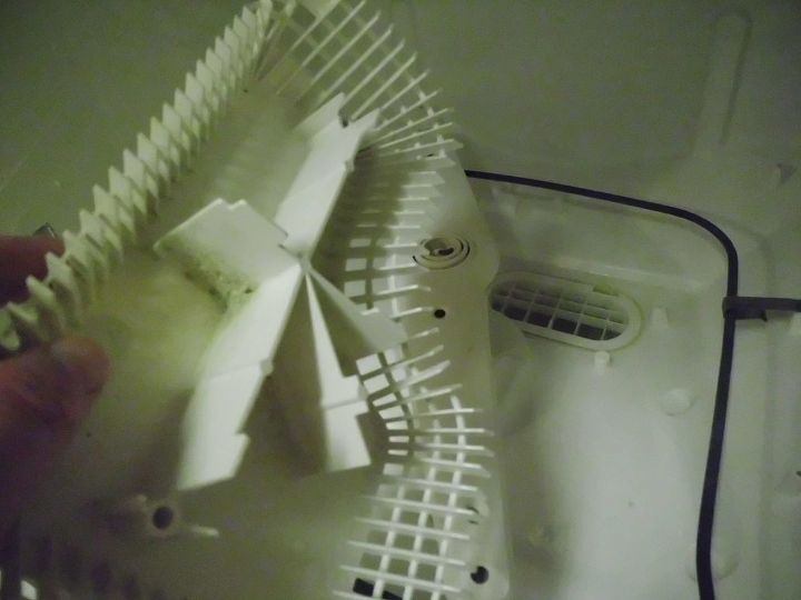 how to clean your dishwasher, appliances, cleaning tips, Remove the screws to the filter cover take the cover off and remove the loose parts in the filter area to be cleaned Get the full article at survivalathome com