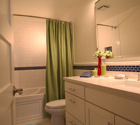 here is a hall bathroom that was in need of help the homeowner called in a panic, bathroom ideas, flooring, home improvement, plumbing, tile flooring, Subway tile with some character with a tile wainscott and tile chair rail around the room created just the look our homeowner was trying to achieve