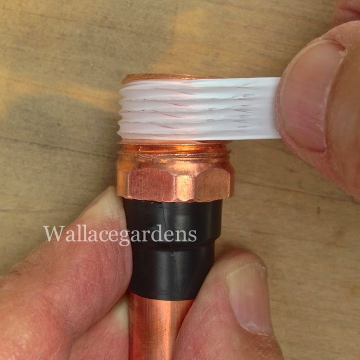 wine bottle watering device with copper tubing for container gardens