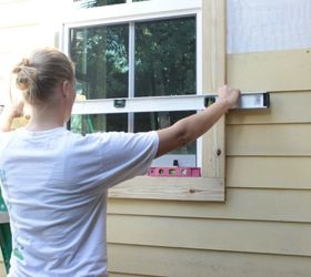 how to install hardie board siding, curb appeal, diy, woodworking projects, Installing Hardie Board siding is a straight forward project making sure to keep each layer of siding level even around windows and doors is an important step