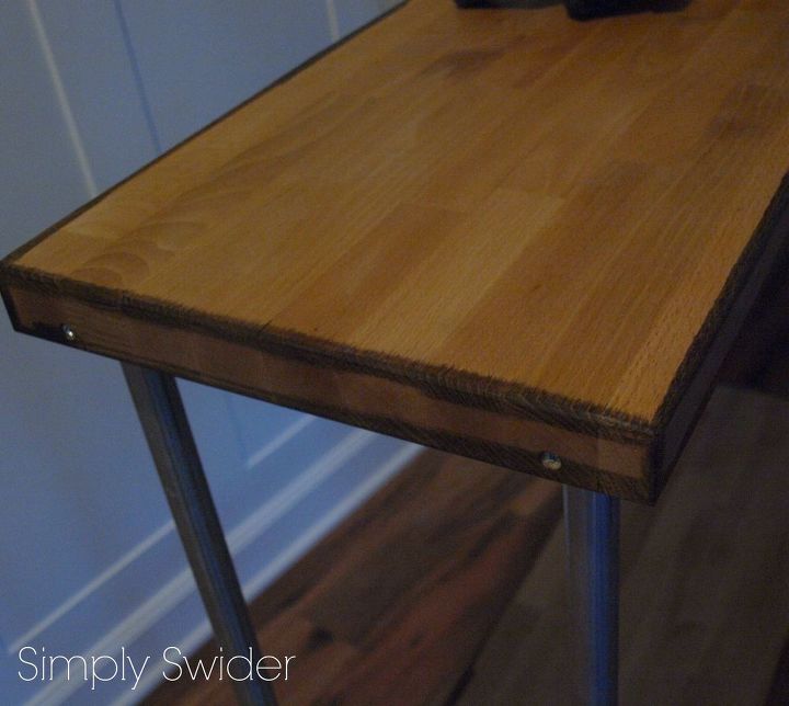 industrial console table tutorial, painted furniture, To give the table an aged look I first applied a darker stain to just the edges of the wood then immediately went over the whole table with a lighter stain