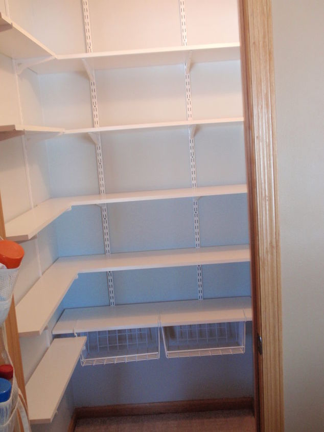 coat closet made into a simple walkin pantry, closet, storage ideas, Went with a very light blue and chose the white shelving Love that I can adjust the shelve to the height I need Each side was made in differant depth The sides were 4 inches 6 inches and the back wall 12 inches