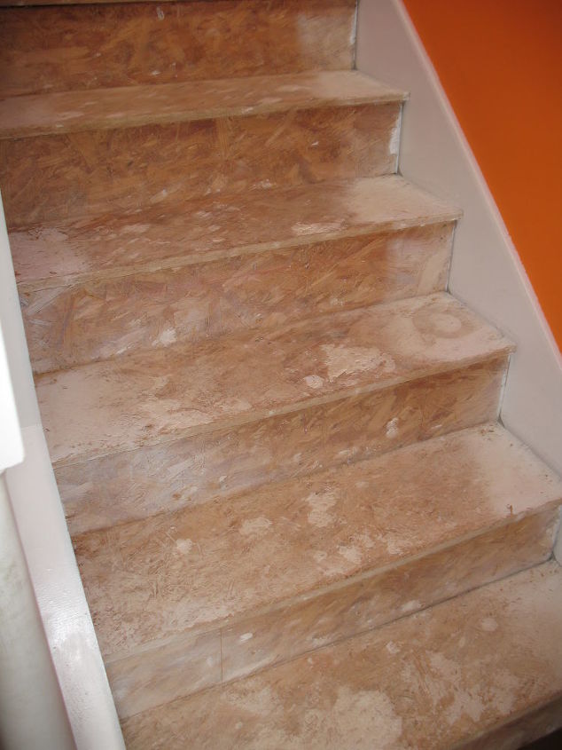 q stairs remodel, home decor, stairs, tiling, before used to be carpet