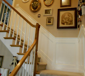 My stairwell with painted scallops and new wainscoting.