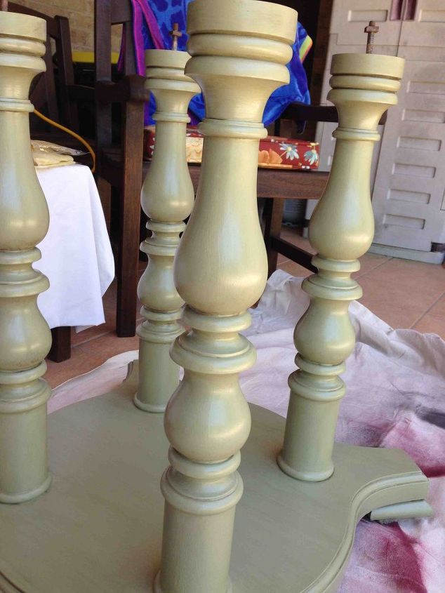 refinishing a dining room table, Applied a color wash of a gray to soften the green and give it an aged look 6 parts glaze mixed with one part sample paint bought at Lowes called English Tea Party