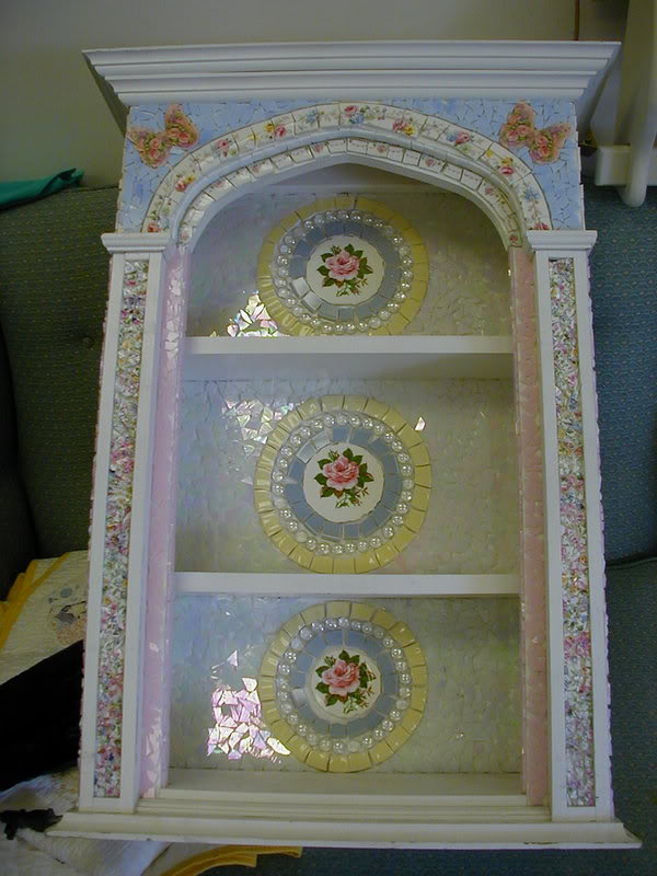 my mosaic pieces, crafts, painted furniture, This is a curio cabinet that is heavy and sets on a table It is made out of beautiful china stained glass and kiln fired butterfly designs