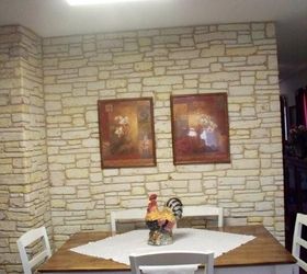 plain walls are transformed in to stone walls with joint compound, painting, wall decor
