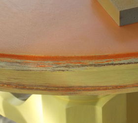 been busy re doing a table i found along side a dumpster, painted furniture, after side and bottom were painted yellow I painted the grooves a burnt orange