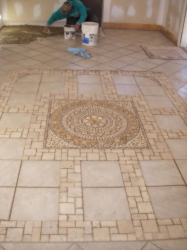 this is a heated stone tile floor in a sun room i laied this floor from center out, flooring, tile flooring, tiling