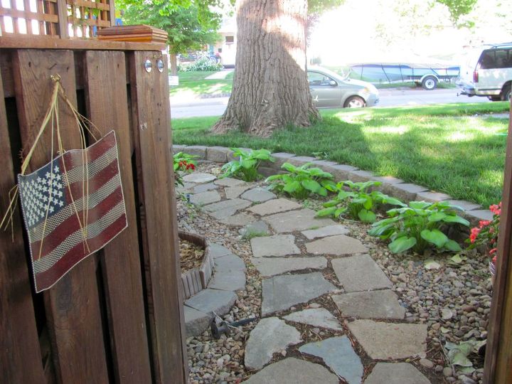 backyard mega makeover, gardening, outdoor living, patio, porches, Gate from side yard with upcycled what a nice way to say we hauled concrete rubble from the dump pathway There was a gate of sorts here but nothing more than a muddy path