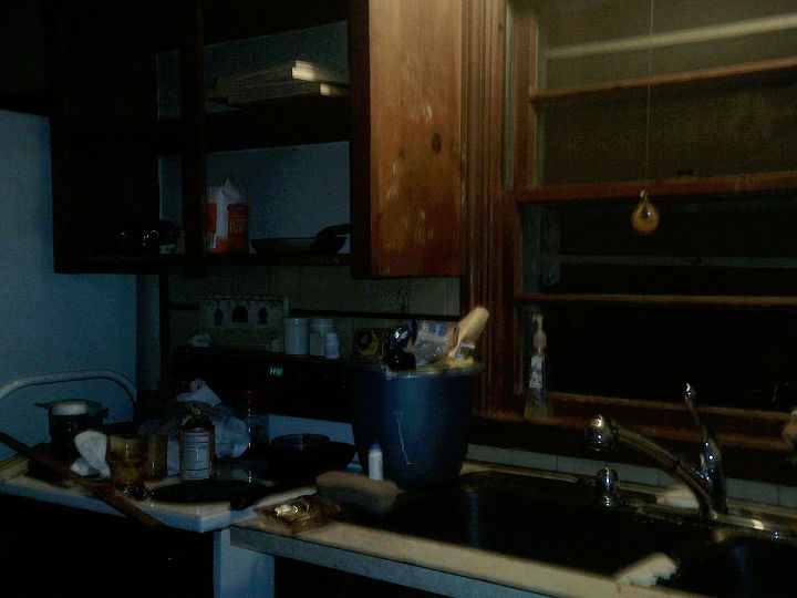 transformation of a 1950 s kitchen in to my dream kitchen, doors, kitchen backsplash, kitchen design, shelving ideas, Double cast Iron sink double hung window over the sink I couldn t reach to open with a view of my back yard neighbors house They both just had to go