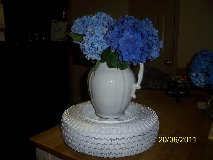 the leopart tire planter, gardening, repurposing upcycling, STEP II Paint entire tire RIM INCLUDED in your choice of base color Remember this pic it made it s debut as a Plant Stand when I featured my Hydrangeas Surely this tire has a more prestigious future remember the crazing