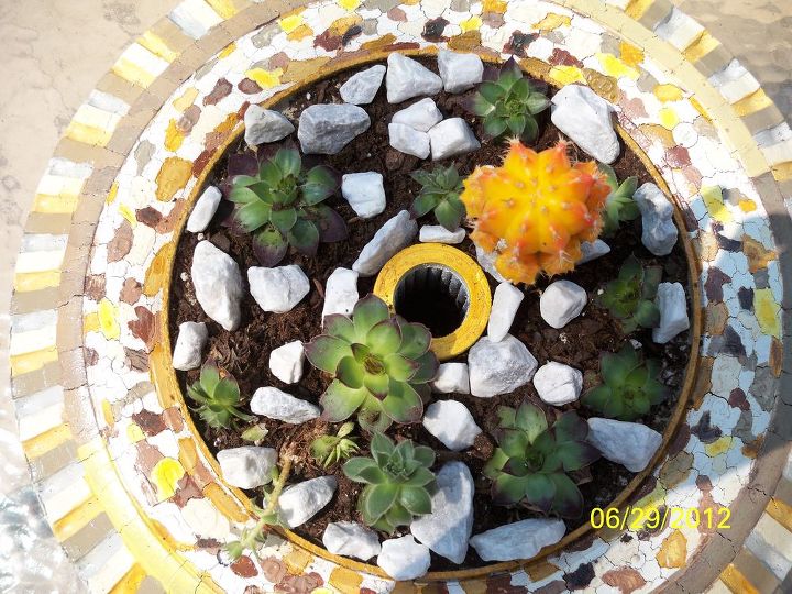 the leopart tire planter, gardening, repurposing upcycling, Dress it up with some pretty white granite gravel