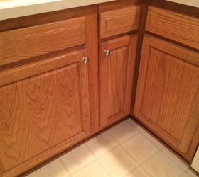 which hardwood with honey oak kitchen cabinets, Existing cabinets with linoleum floor Dishwasher corner visible