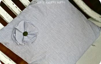 Pillow made from mens dress shirt.