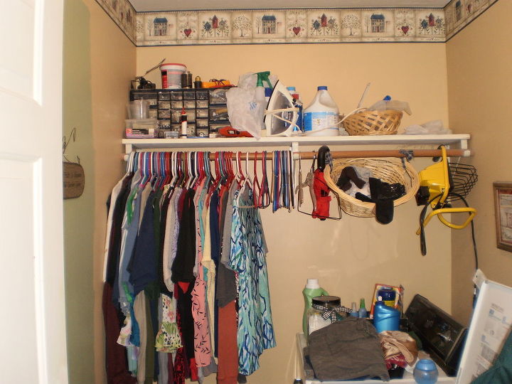 my 186 laundry room makeover, home decor, laundry rooms, organizing, Before a big cluttered mess with tan colored walls and cheap wall paper border Absolutely no organization in here whatsoever and this room served as a basic catch all room for all our junk