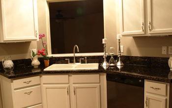 We painted our COUNTERTOPS!! The system we used is super durable, no chipping, and still looks brand new one year later.