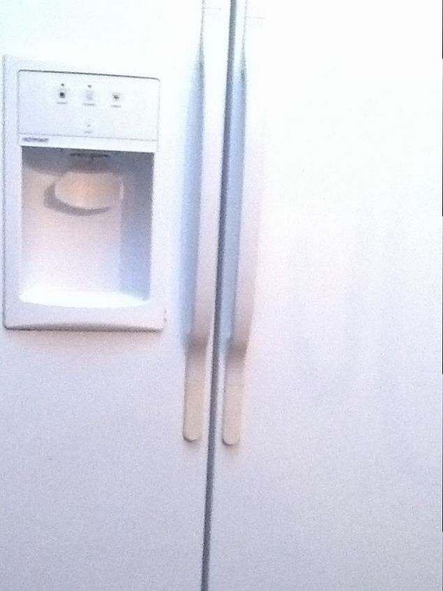 yellowed refrigerator door handles, Yellowing on handles especially toward the bottom