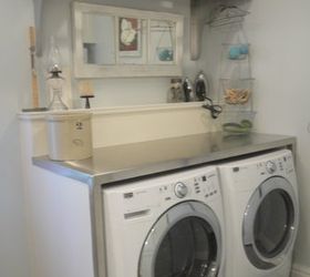 laundry room makeover in 1918 farmhouse, doors, home decor, home improvement, laundry rooms, Counter top for folding and rack above for storing laundry baskets and hanging clothes to dry on hangers made from stainless steel by my husband