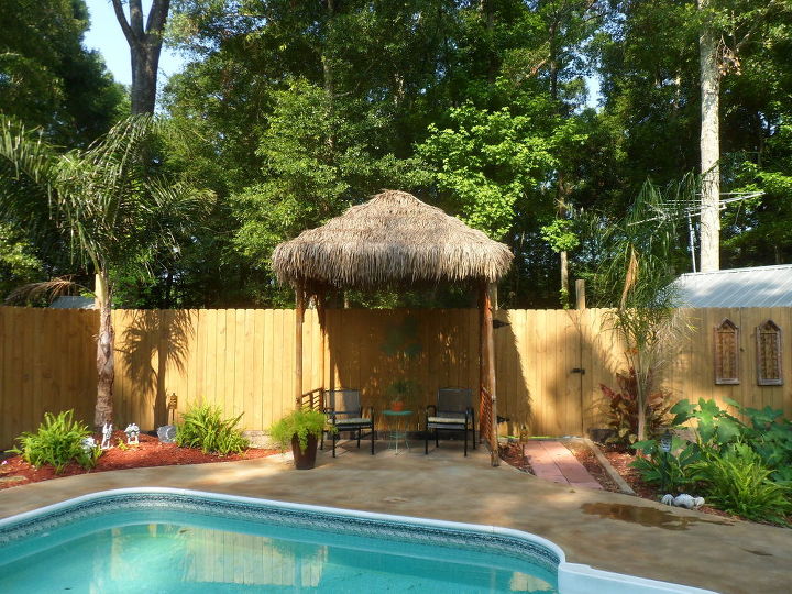 diy outdoor tiki hut using repurposed materials, home improvement, outdoor living, Our Tiki Hut
