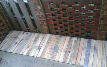 Expanding patio with repurposed pallets