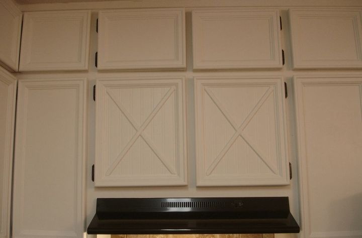 kitchen cabinets updated with moulding, kitchen cabinets, kitchen design, barn door inspired cabinets
