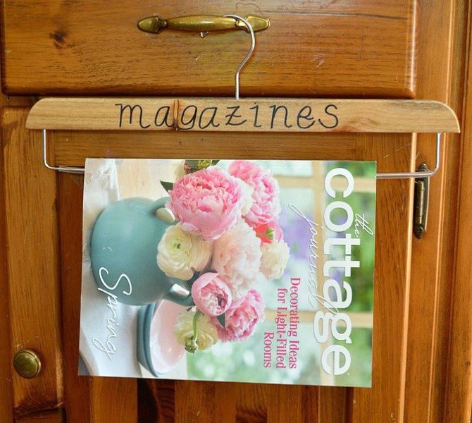 s 15 insanely smart hanger hacks you ll wish you d seen sooner, crafts, organizing, repurposing upcycling, Make a hanging magazine holder