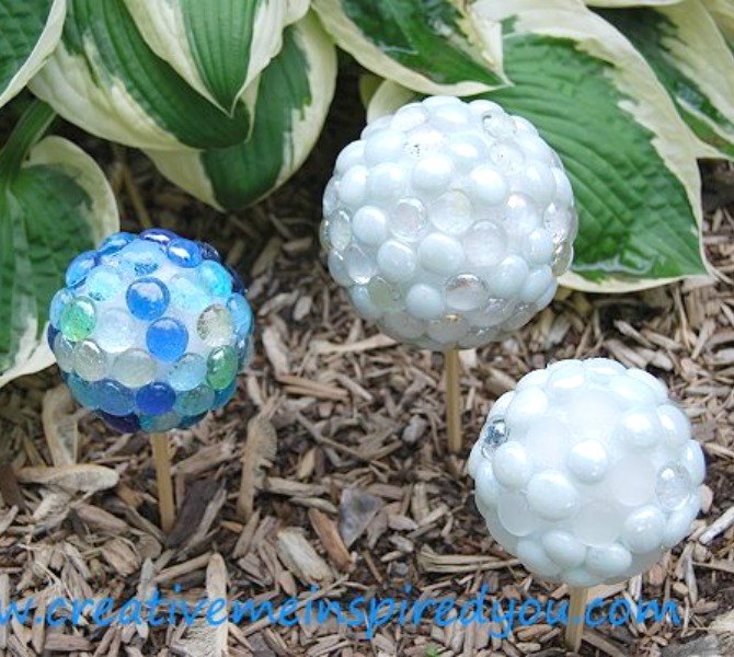 16 stunning ideas for your dollar store gems, Create garden gazing stones