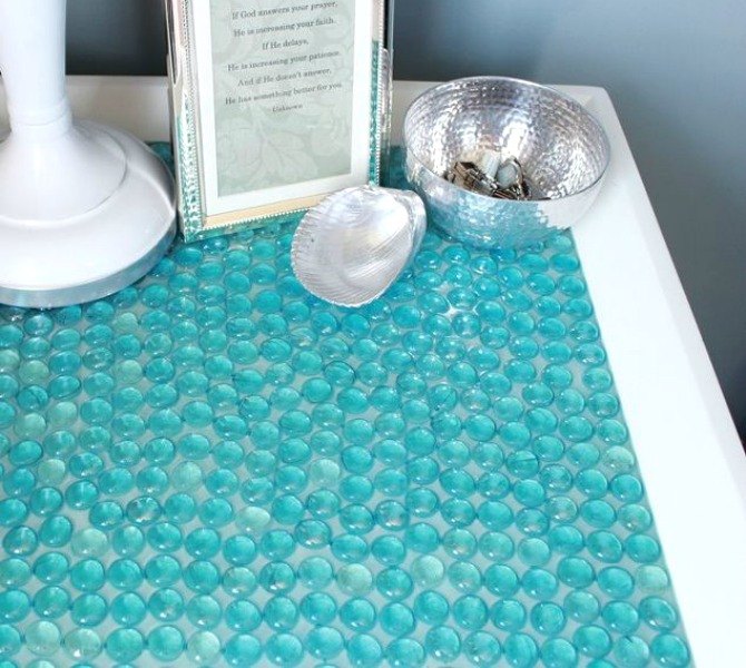 16 stunning ideas for your dollar store gems, Cover an old piece of furniture