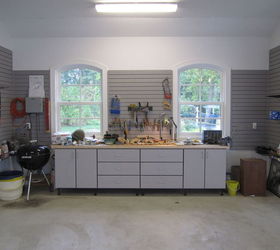 garage organization for a family of 10, garages, organizing, shelving ideas, storage ideas, Dad s work bench includes a butcher block counter top and ample drawer storage