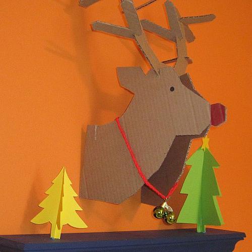 bright amp cheerful kid s christmas decor, christmas decorations, crafts, seasonal holiday decor, I found a template to make this Rudolph head from Good Housekeeping I posted the link on my blog I also made some paper trees from leftover card stock