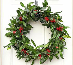 making a fresh evergreen wreath, crafts, doors, flowers, gardening, hydrangea, seasonal holiday decor, wreaths, The holly and laurel branches that make up this wreath grow just outside my door I don t think it needs a single thing added to make it look more festive