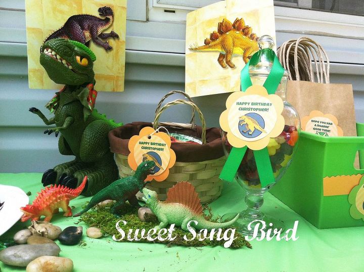 a dino mite party, crafts, Some dollar store bins baskets and moss help to accent the sweets table