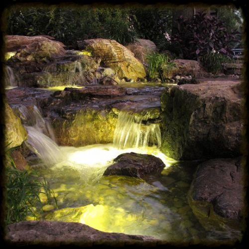 underwater led lighting, lighting, outdoor living, ponds water features, LED Lights under the waterfalls add a dramatic effect