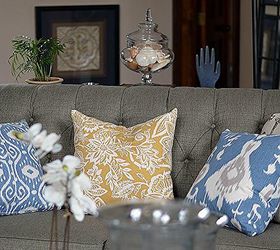 adding color to a neutral great room, home decor, painted furniture, A neutral gray sofa was given a shot of color with some Ikat inspired pillows